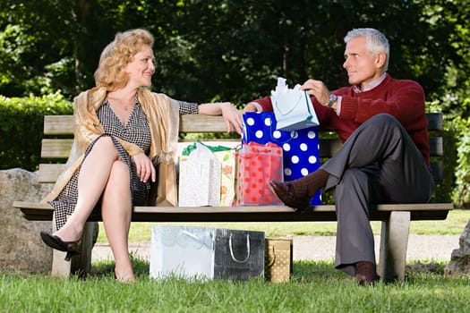 Couple with bags of shopping