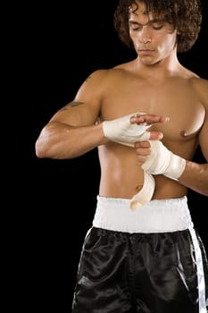 Boxer tying bandage
