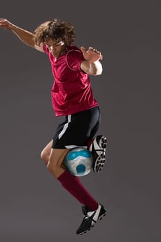 Footballer playing with ball