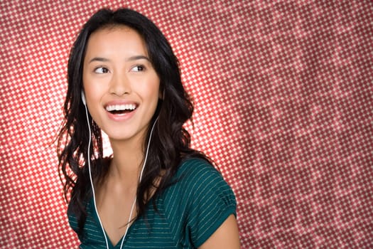 Woman listening to mp3 player