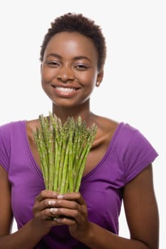 Woman holding asparagus