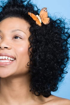 Woman with a butterfly in her hair