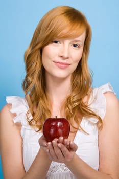 Woman holding an apple