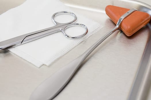 reflex hammer scissors and gauze