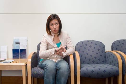 Woman in hospital waiting room