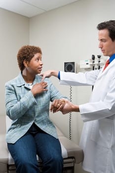 Doctor examining woman