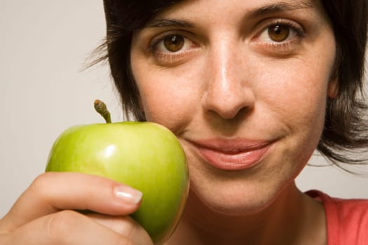 Woman holding an apple