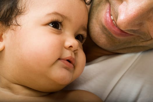 Baby girl and father