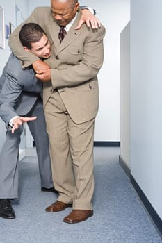 Businessmen fighting