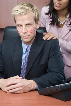 Businesswoman flirting with businessman