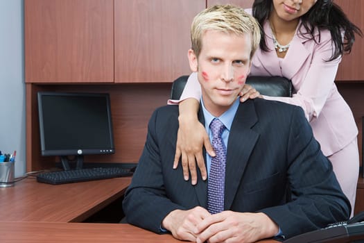 Businesswoman flirting with businessman