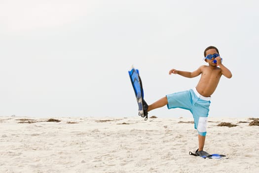 Boy wearing snorkel and flippers