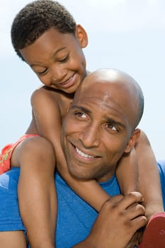 Son on fathers shoulders