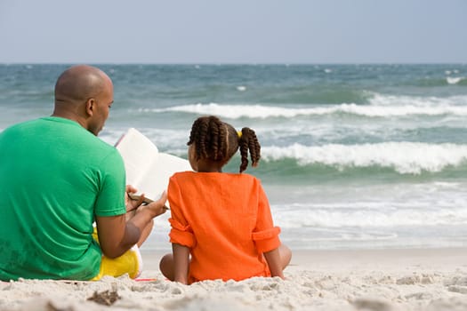 Father and daughter reading