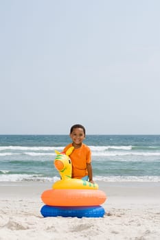 Boy with inflatable rings