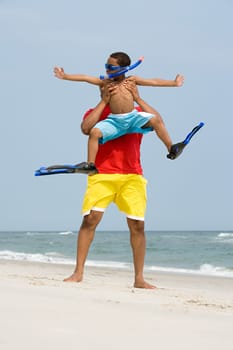 Father lifting son