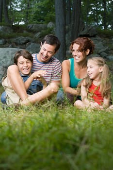 Happy family in forest