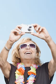 Woman taking a photograph