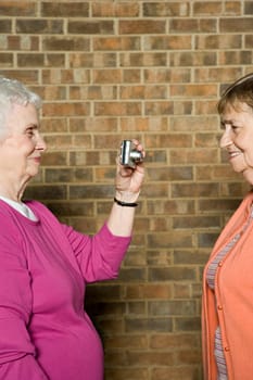 Senior woman taking a photograph