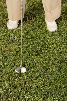 Senior man playing golf