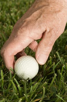 Senior man playing golf
