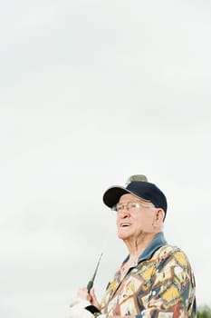 Senior man playing golf