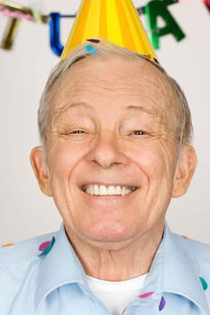 Senior man at a party