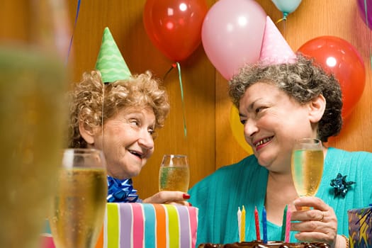 Two senior women at a party