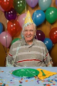 Senior man at a party