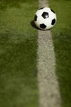 Soccer ball on sports field