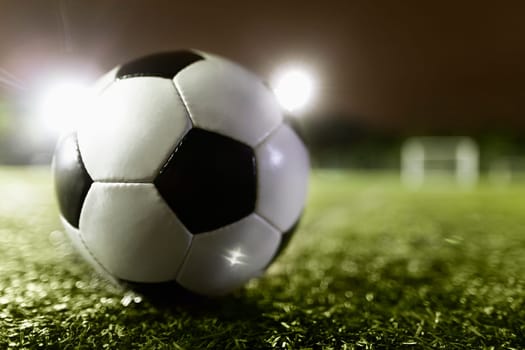 Soccer ball on sports field