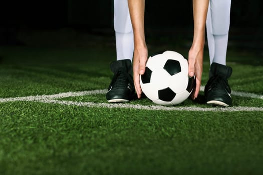 Athlete placing soccer ball for corner kick