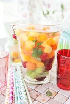 Homemade punch with various fresh fruits