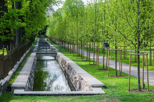 TALLINN, ESTONIA - MAY 15: Picturesque water canal in spring time Kadriorg park on May 15, 2016 in Tallinn, Estonia.