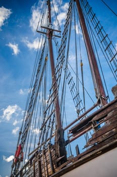 Old collapsing sailboats at the dock, close-up