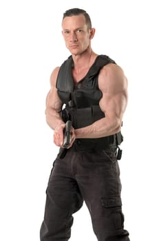 Man with tactical vest and gun isolated in white