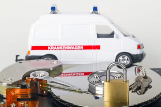 Geo-opened hard drive with small padlock in detail