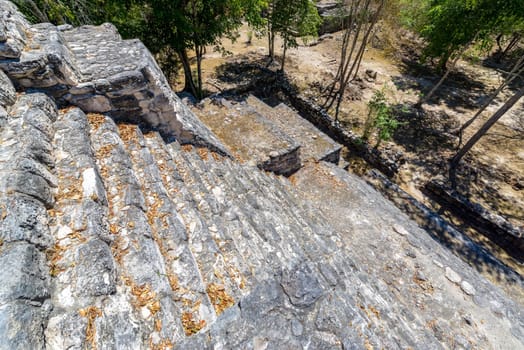 View of steep stairs on a Mayan temple in the ancient city of Balamku in Campeche, Mexico