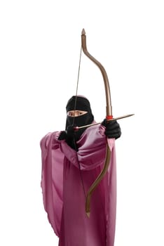 Focus asian muslim woman with hijab ready to shoot an arrow isolated over white background
