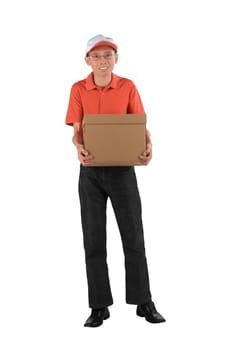 Young asian courier holding a cardboard box while standing isolated against white background