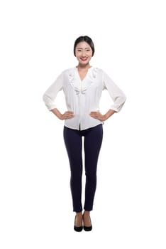 Beautiful asian business woman posing with hands on waist isolated over white background