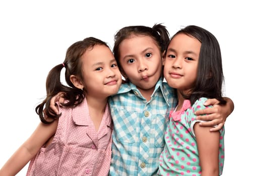Funny expression asian small kids with her friend isolated over white background