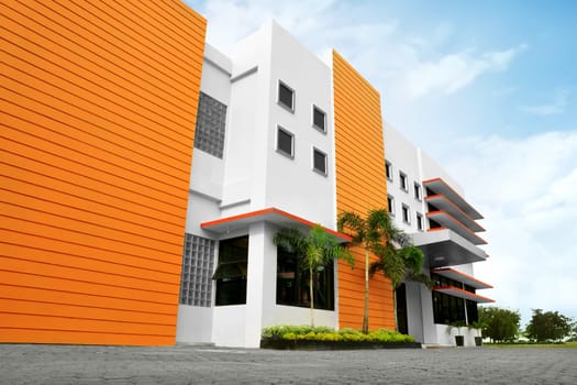 Stylized modern office building with parking lot in front of it