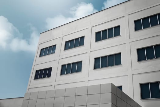 Large office building with modern corporate architecture over cloudy sky