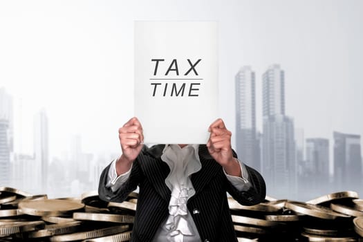 Businesswoman covering her head by Tax Time announcement on board