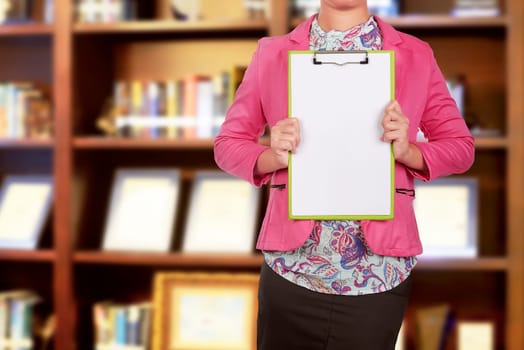Business people holding blank clipboard for copyspace on the office
