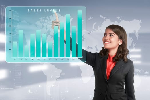 Asian business woman touching marketing sales income levels chart on virtual screen