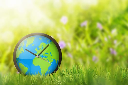 Clock of earth in the field. Earth Hour Concept.