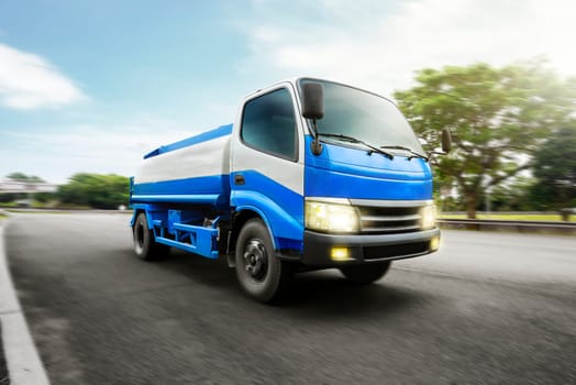 Truck with fuel tank transport liquid cargoes on the highway