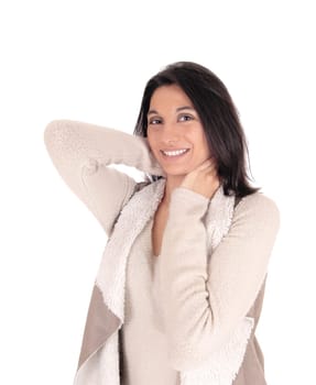 A beautiful young Hispanic woman in a deerskin jacket standing with.her hands on her neck, isolated for white background..